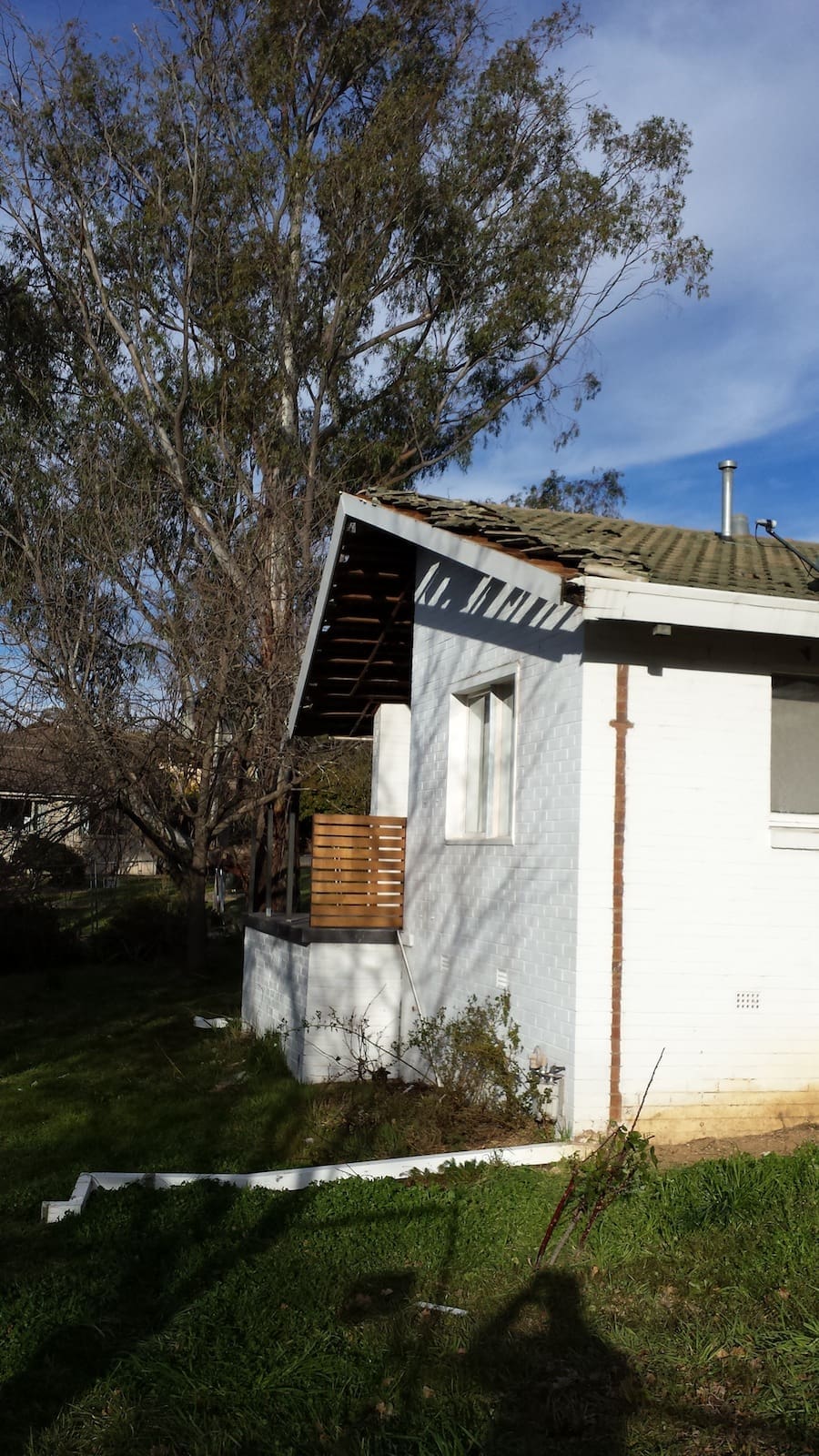 Roof tiles and eaves have been removed pre-demolition