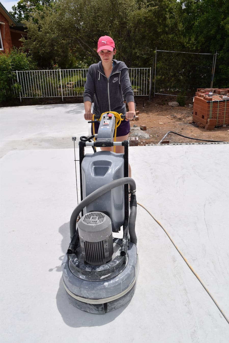 Gina using the concrete machine