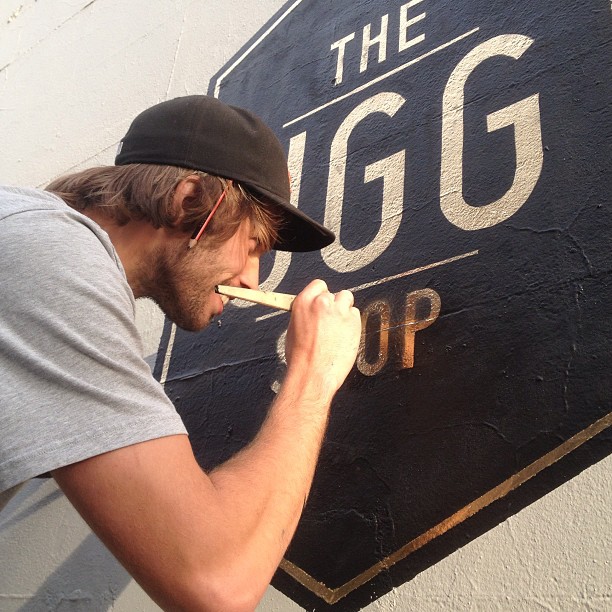Jamie working on the Ugg Shop signage
