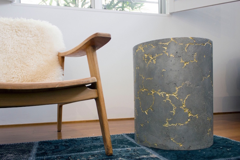 Concrete side table with gold foil detail