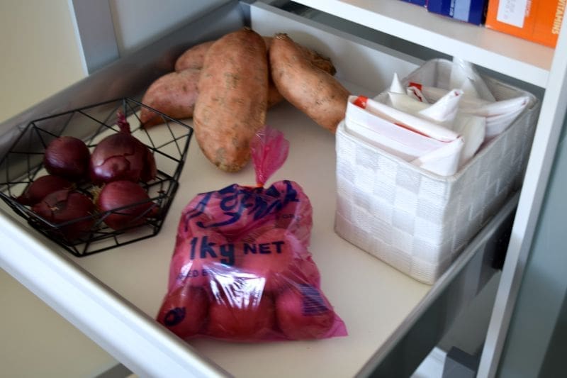 Folded plastic bags take up next to no space and help pantry declutter