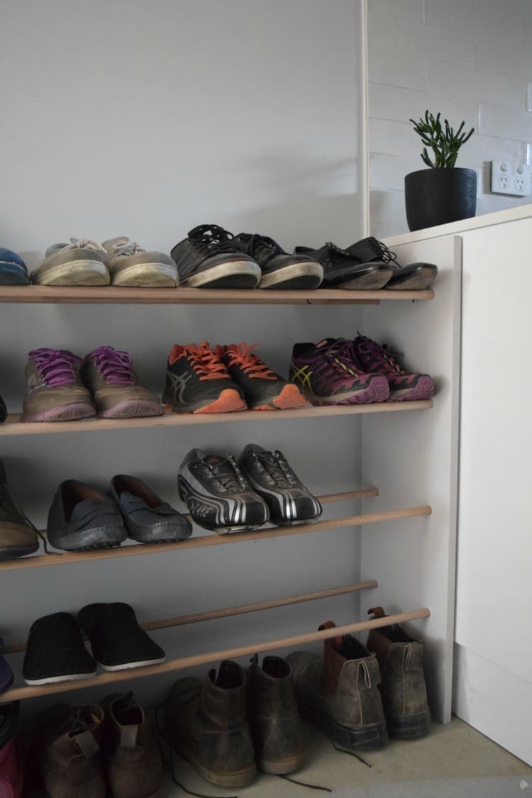 Close up DIY dowel shoe rack