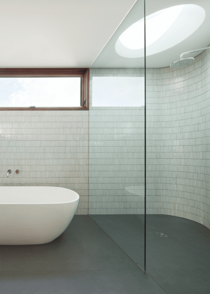Bathrooms that don't use white tiles stacked marble tile
