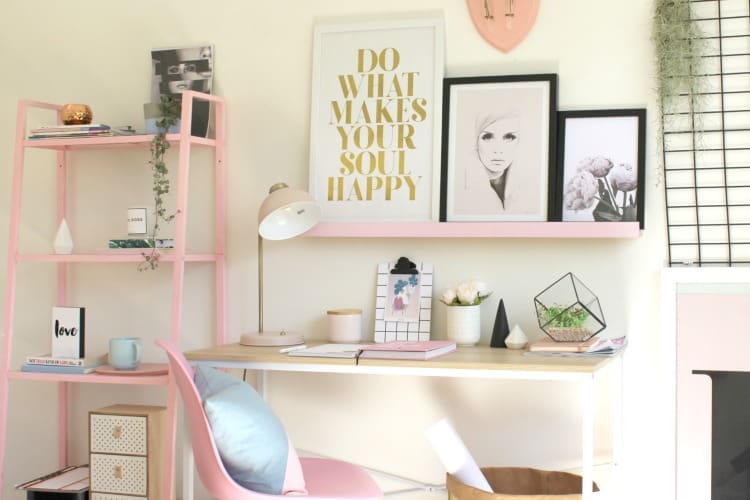 Painted shelves add a pop of pink in this colourful home