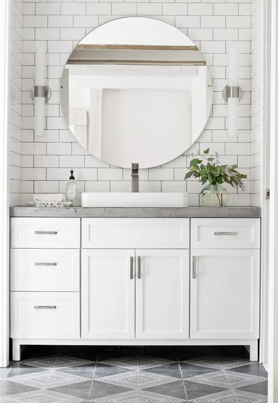 White bathroom with concrete vanity bench