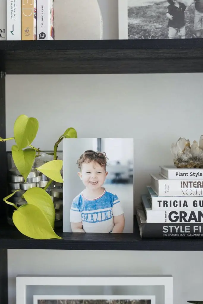 Photo block ways to incorporate family photos in shelf styling