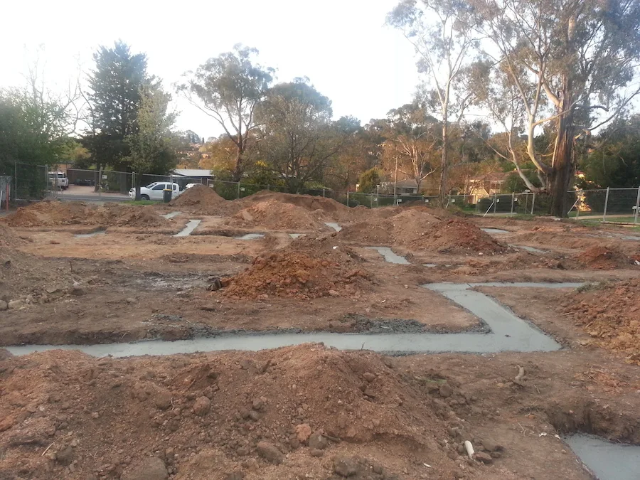 Concrete strip footings done construction update after site cut