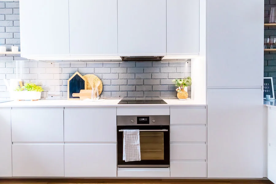 Pantry and oven seamlessly fit into full house renovation