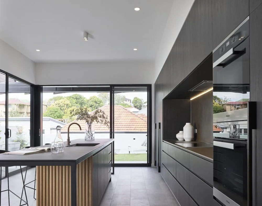 Black and wood feature kitchen modern construction