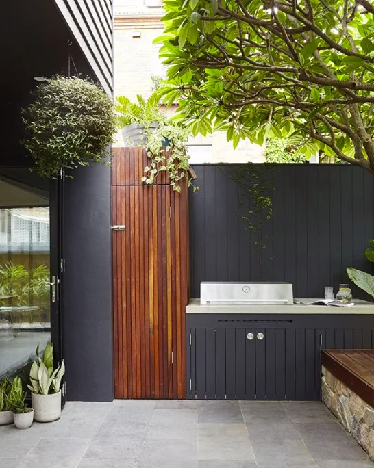 Black and timber outdoor kitchen