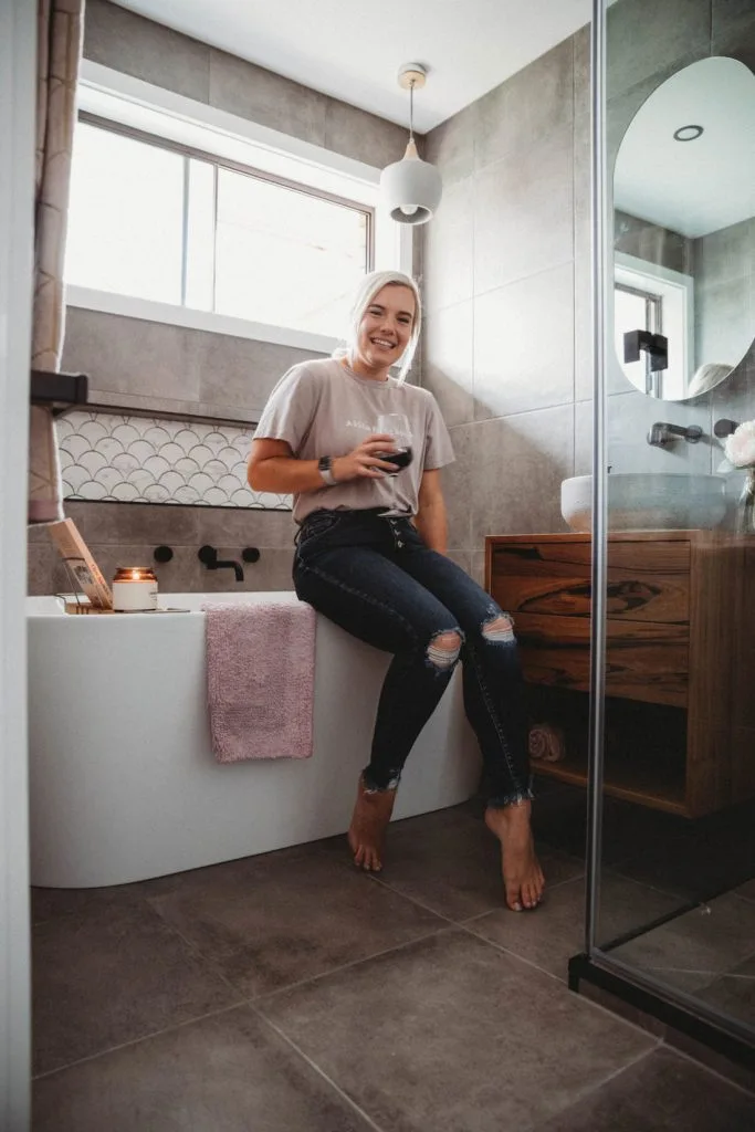 Olivia in her new bathroom