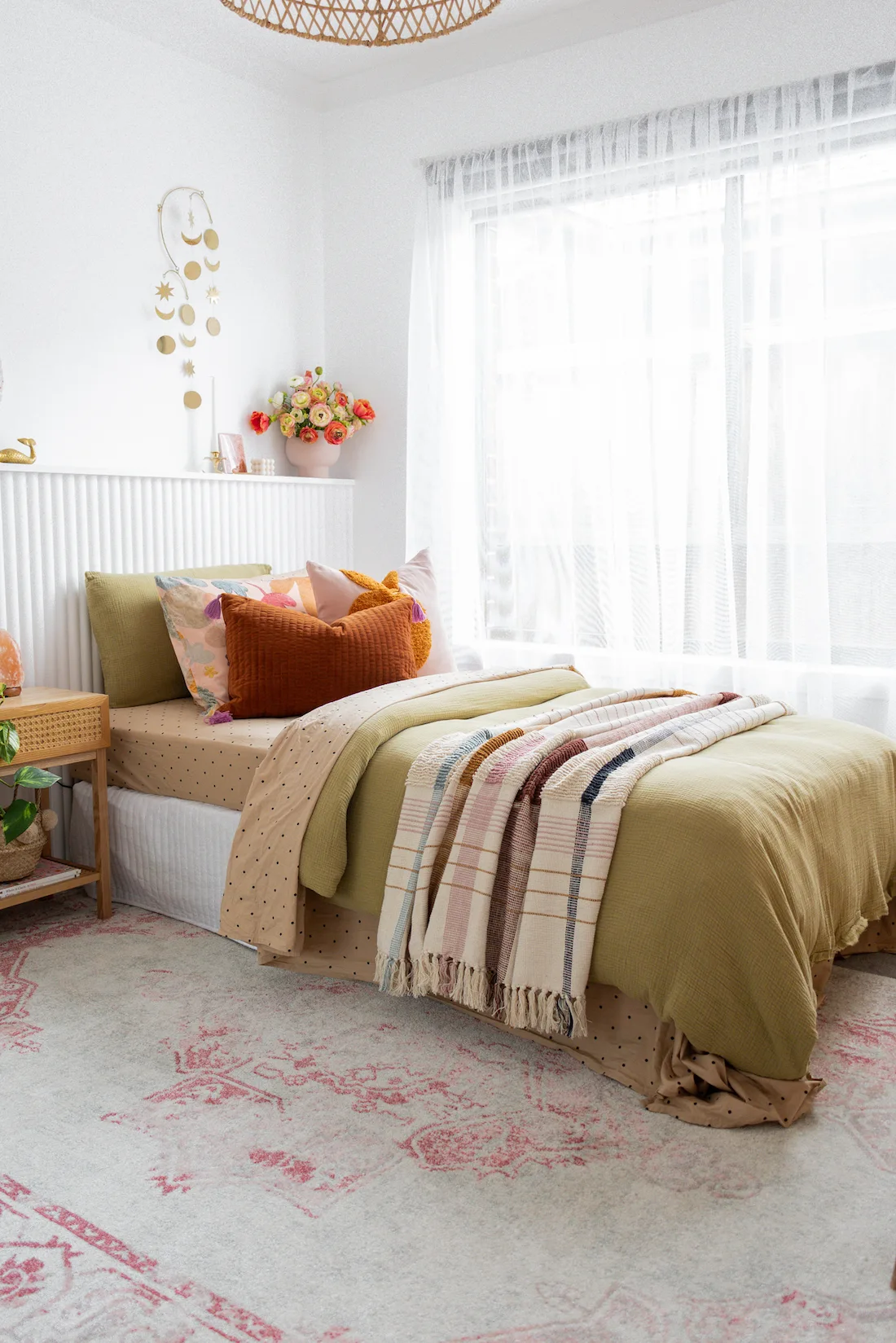 Olive green bedding in young girls bedroom