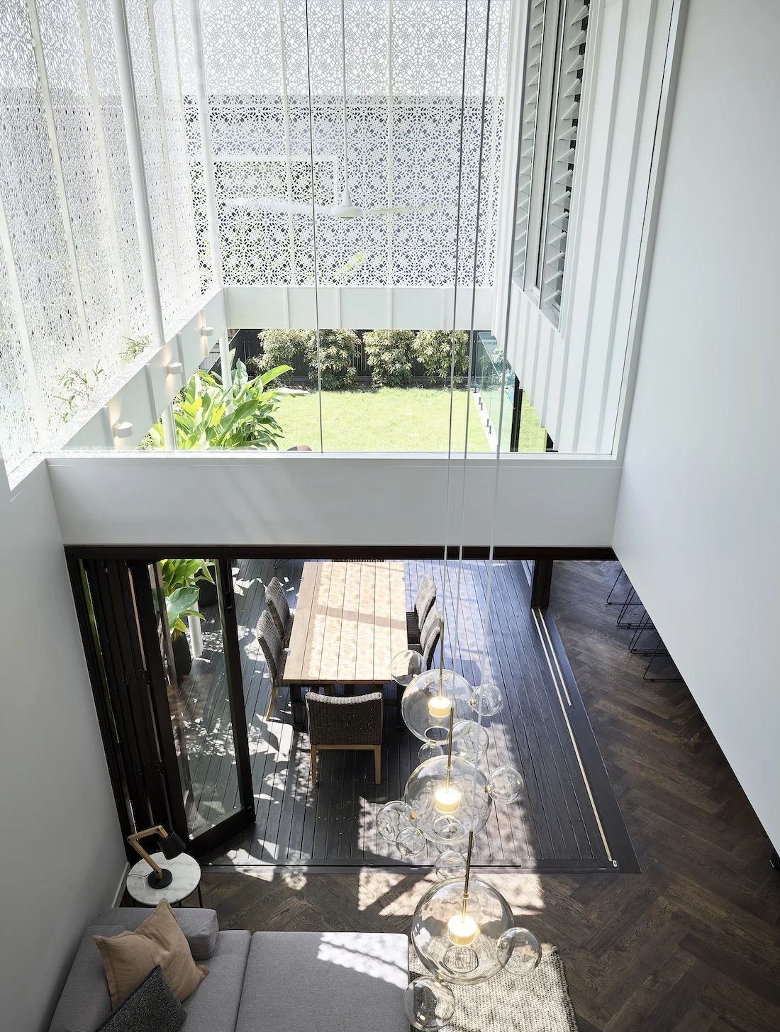 Birds eye view from staircase down to open plan living