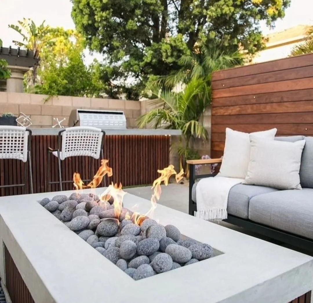 Grey stones in white firepit