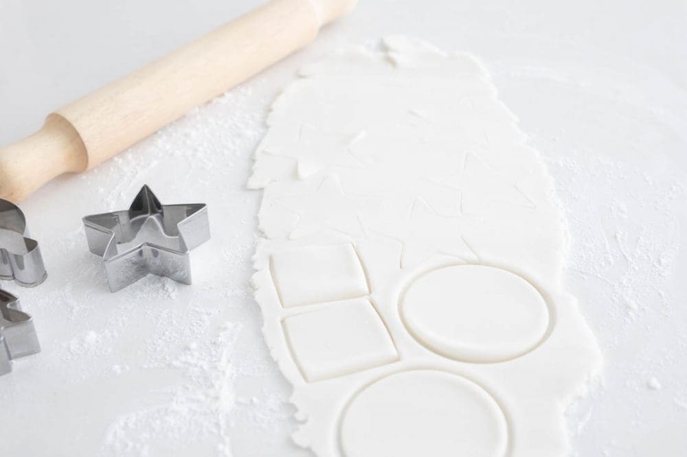 Using cookie cutters to make DIY Christmas clay ornament