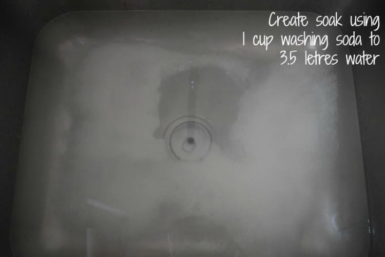 Soak fabric in washing soda