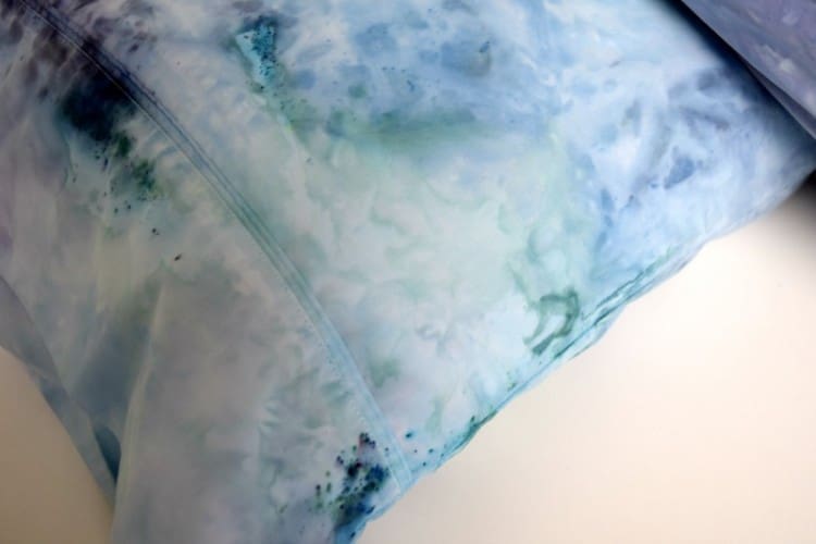 Ice dyed pillow with abstract patterns