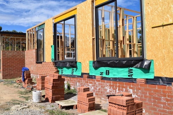 Front of our house getting bricked up