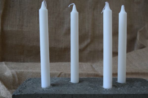 DIY concrete candleholder feature