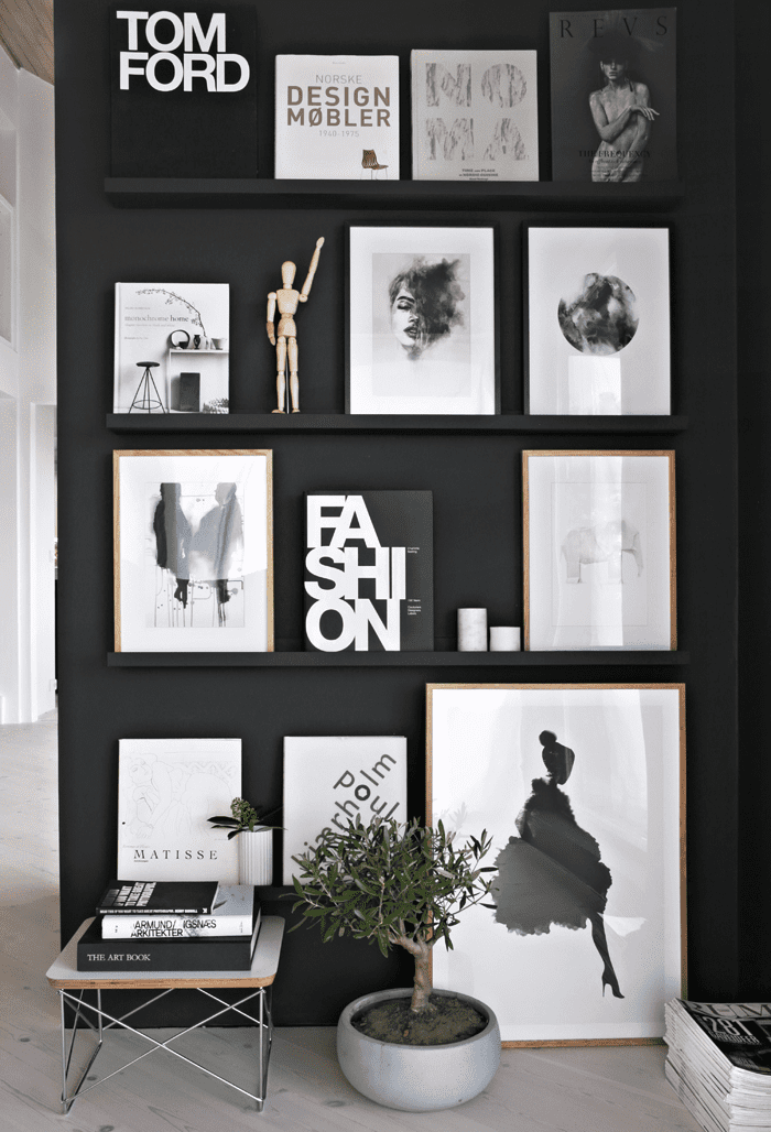 Gallery wall and indoor plant ways to achieve a Scandinavian interior style