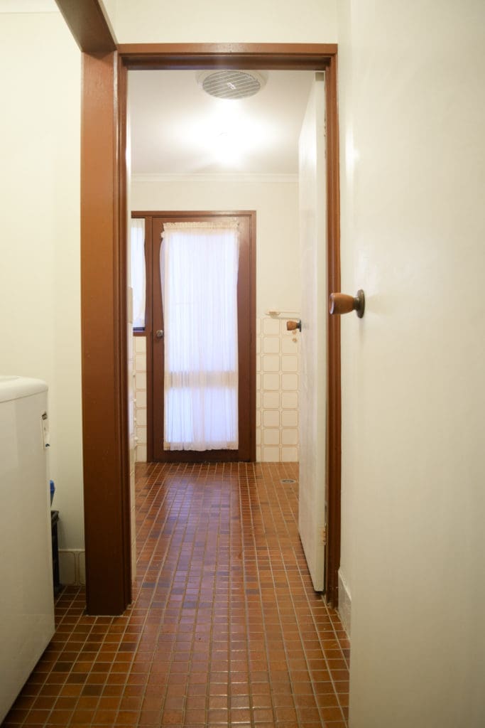 Looking into old bathroom