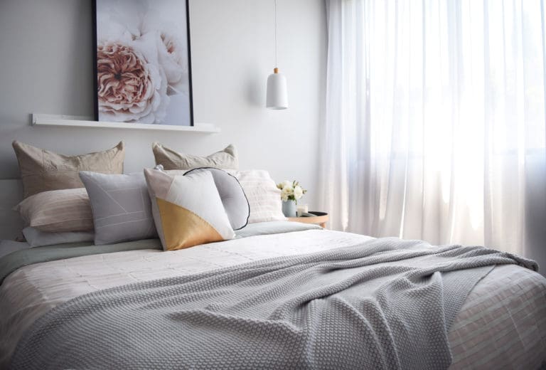 Muted blush pink and gold bedroom with Siesta Home