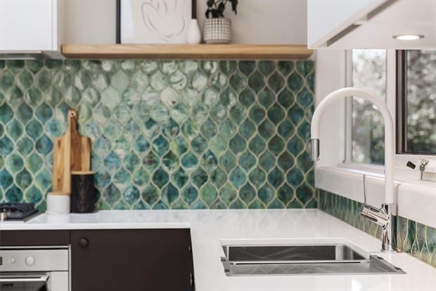 white kitchen green splashback