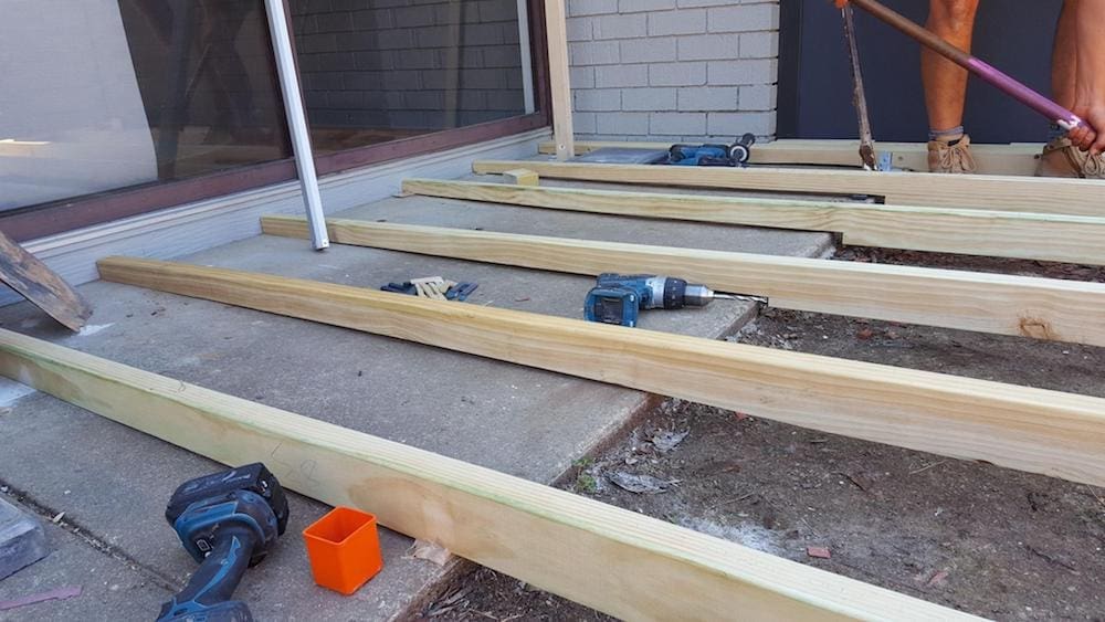 Installing a new Trex deck at Bonnie’s house Style Curator