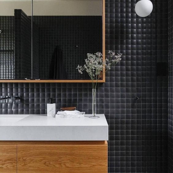 Curved black mosaic tile