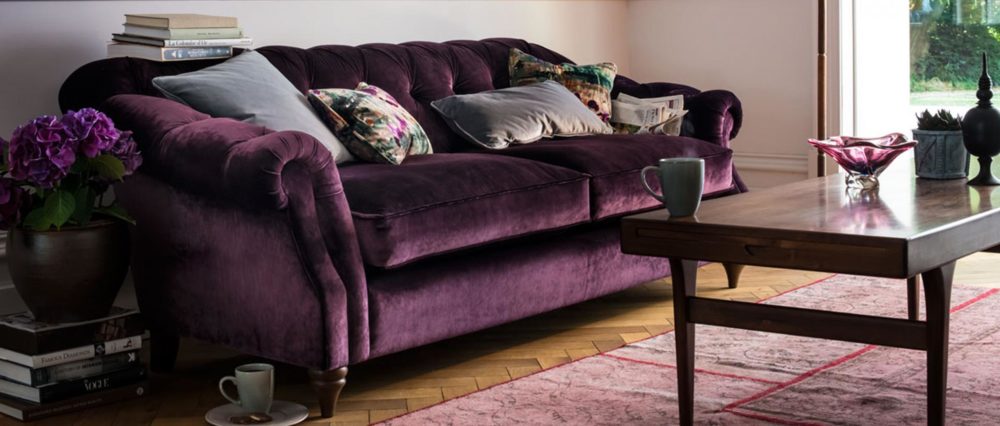 Purple velvet sofa