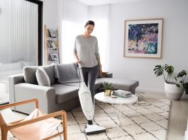 Vacuuming carpet