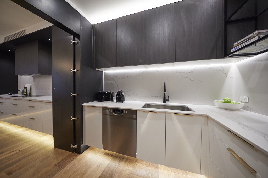 Black overhead kitchen cabinets