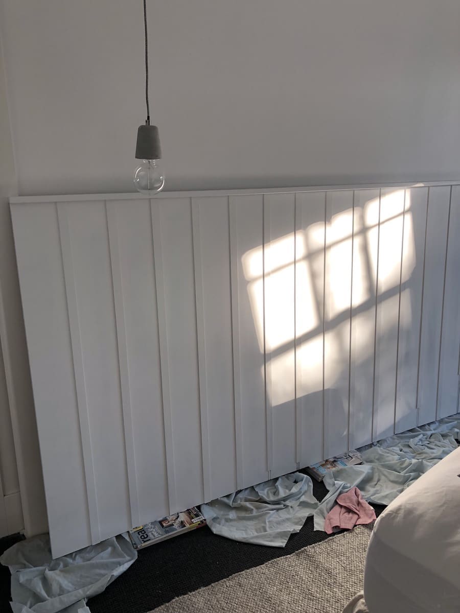 Painted DIY wall panel bedhead