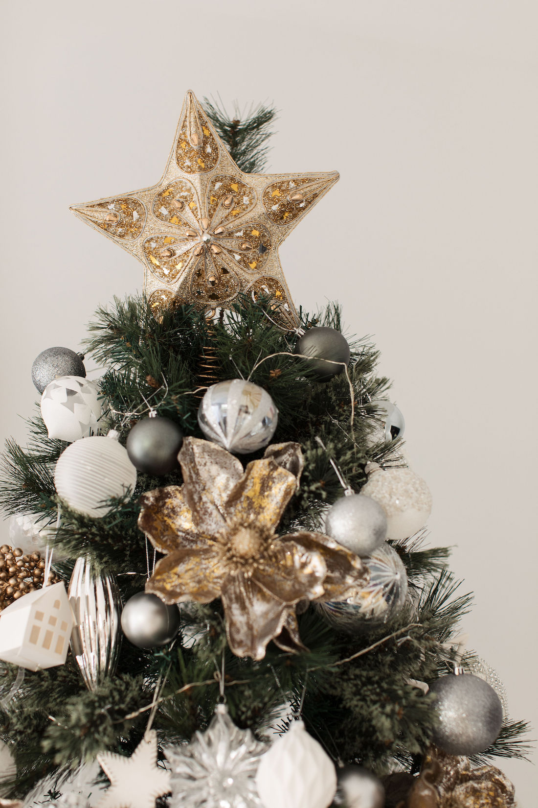 A Christmas tree styling tips is to add a star or angel on top of your tree