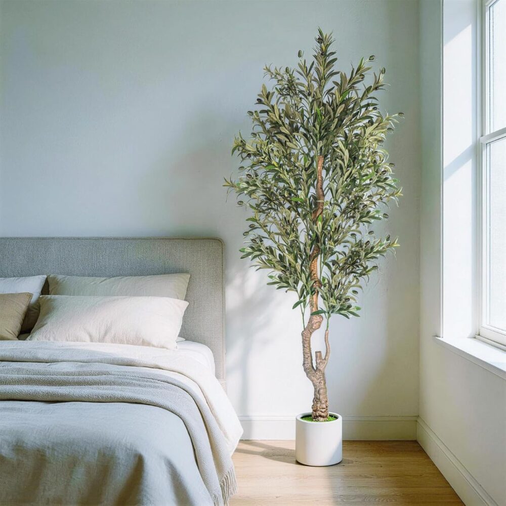 Artificial potted olive tree in bedroom