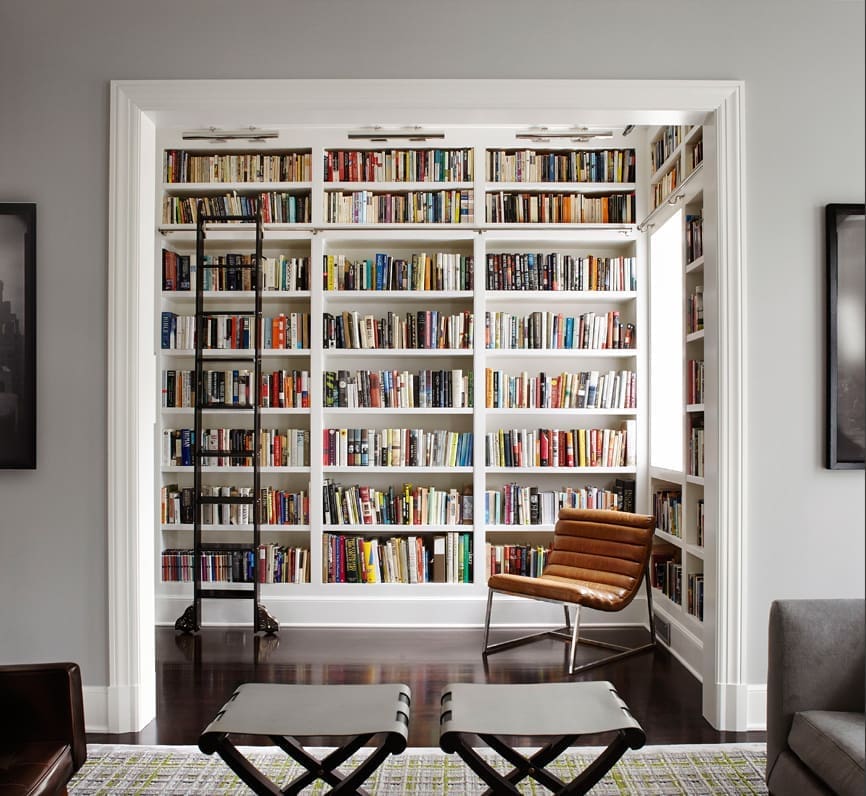 slanted book display  Midcentury house, Home library design, Home libraries