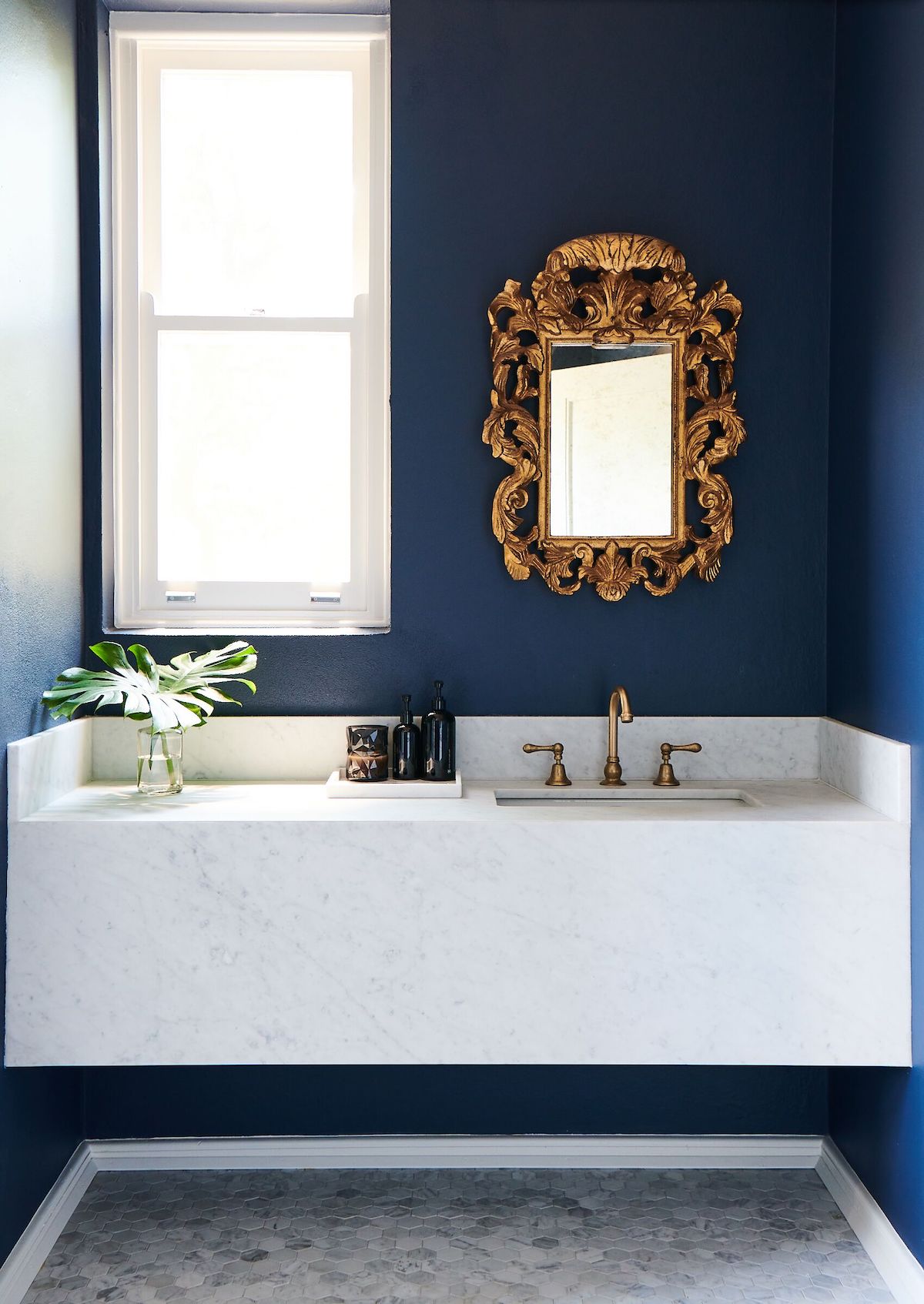 Hexagon marble floor in luxe powder room