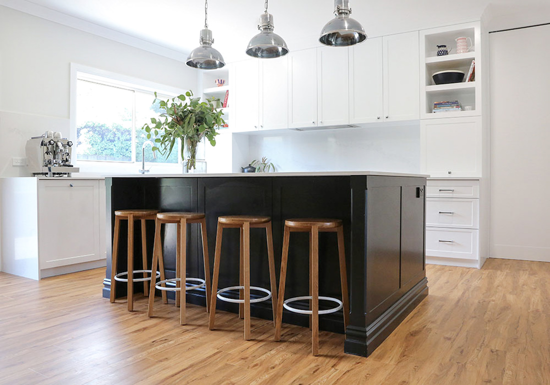 Completed kitchen transformation with new black kitchen island