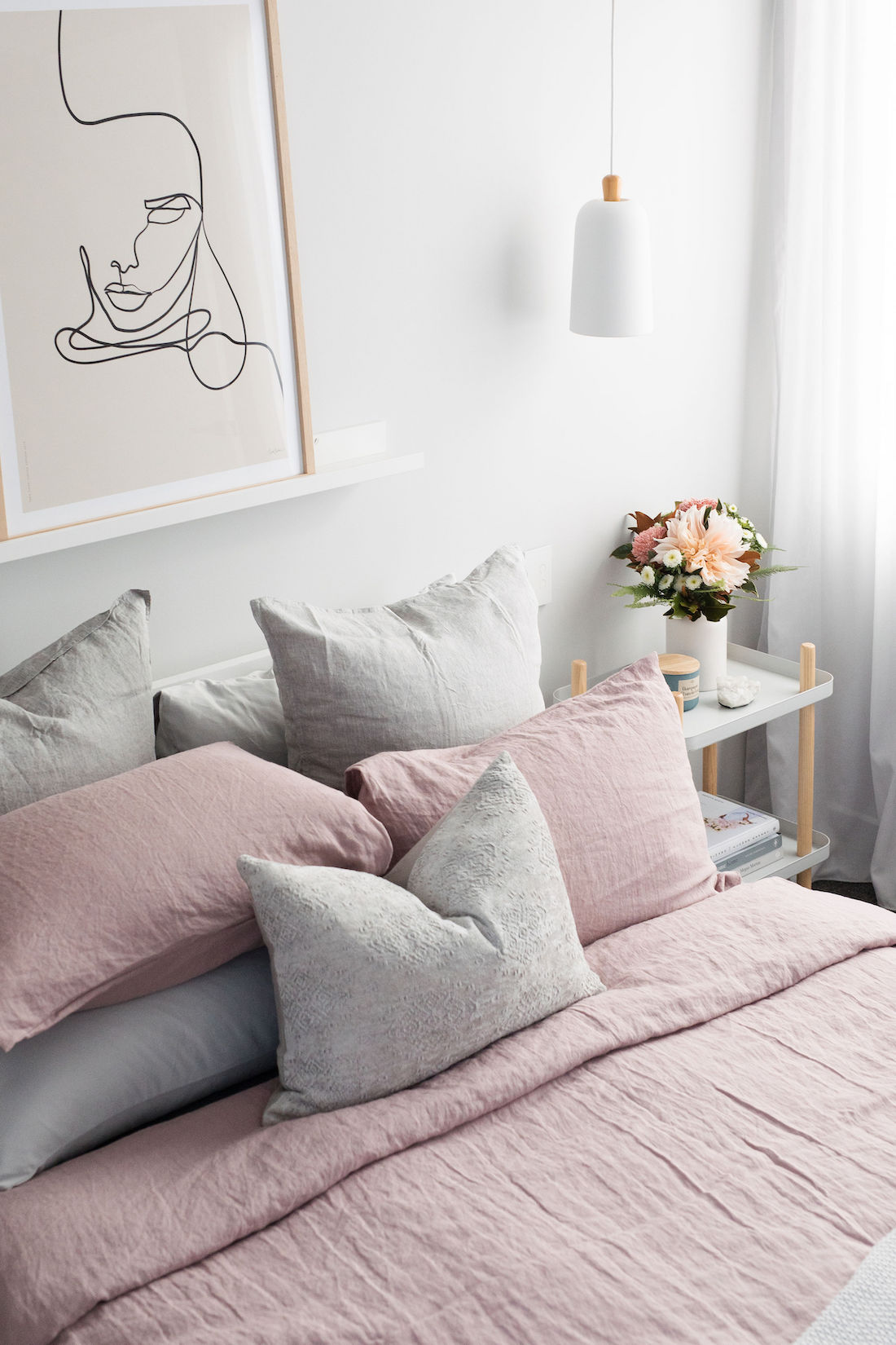 Dusty rose bedding and grey cushions