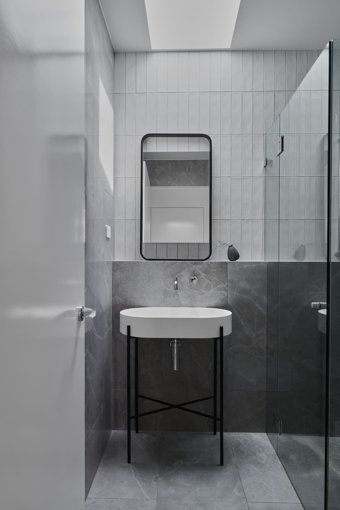 Amazing sink in grey powder room