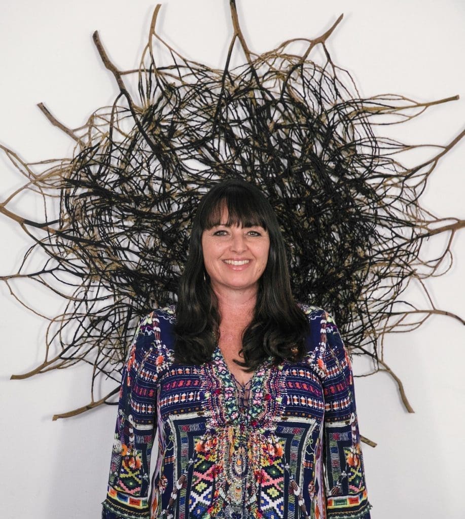 Catriona Pollard_artist profile with woven art piece