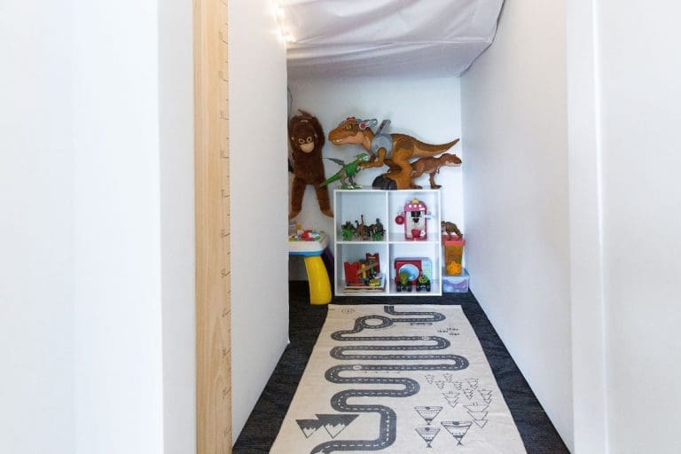 Gina’s home: Hidden under-stair cubby (makeshift playroom)