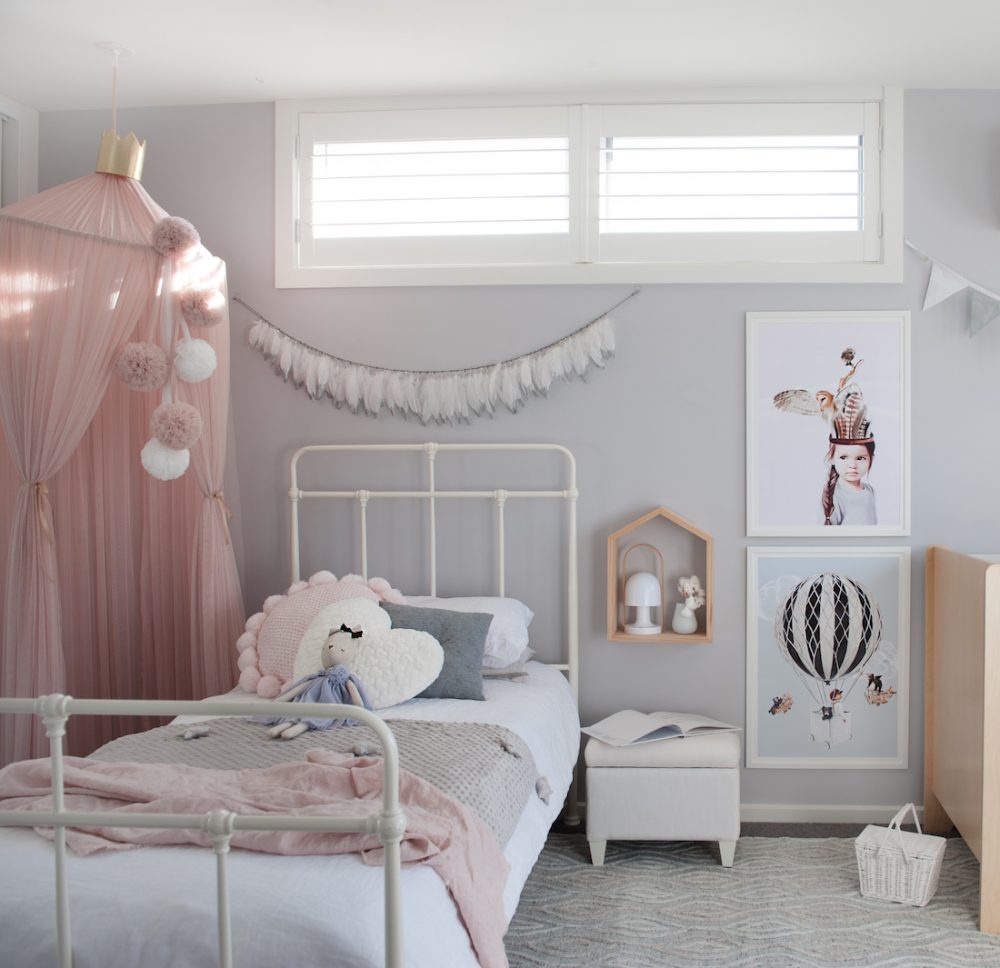 Girls bedroom with pink canopy