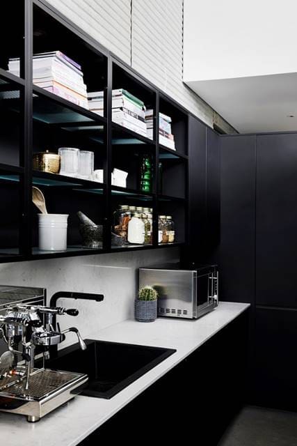 Black cabinetry inside butlers pantry Guy Sebastian kitchen