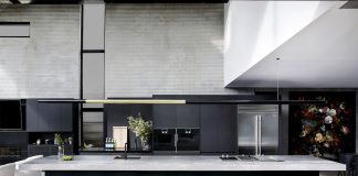 Black and grey kitchen with extra long bench