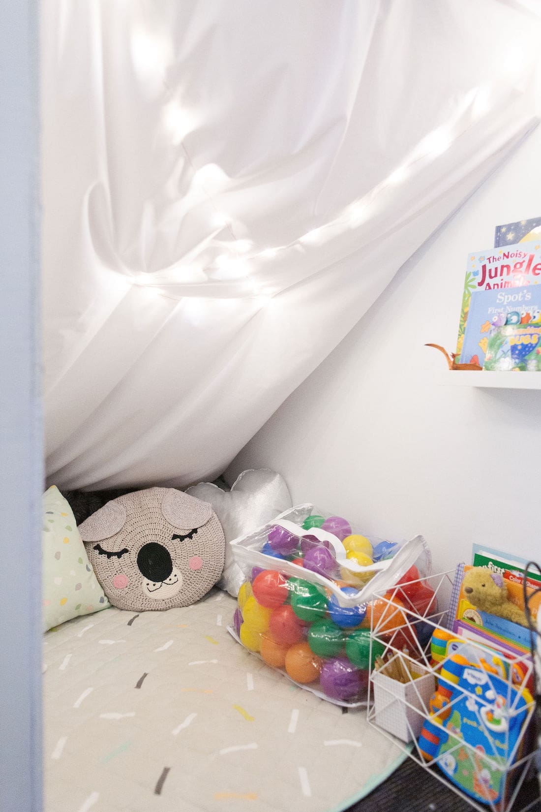 Reading nook in under stair cubby