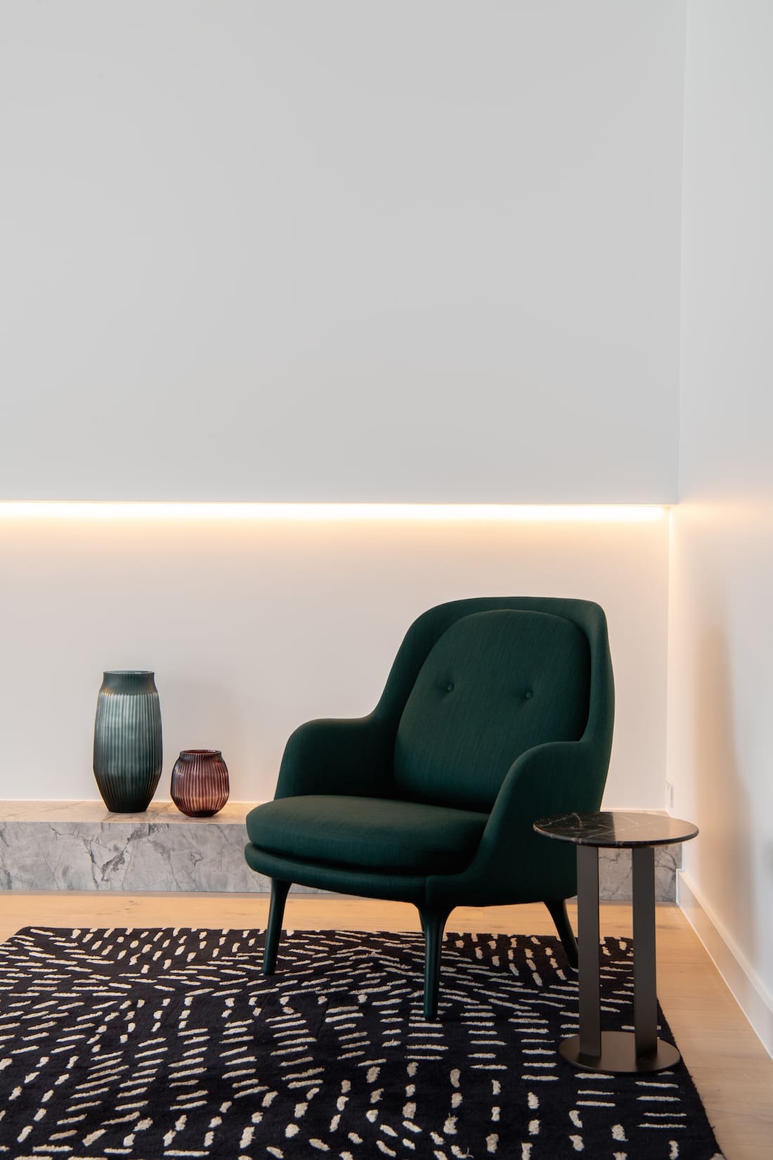 Stone plinth feature in lounge room