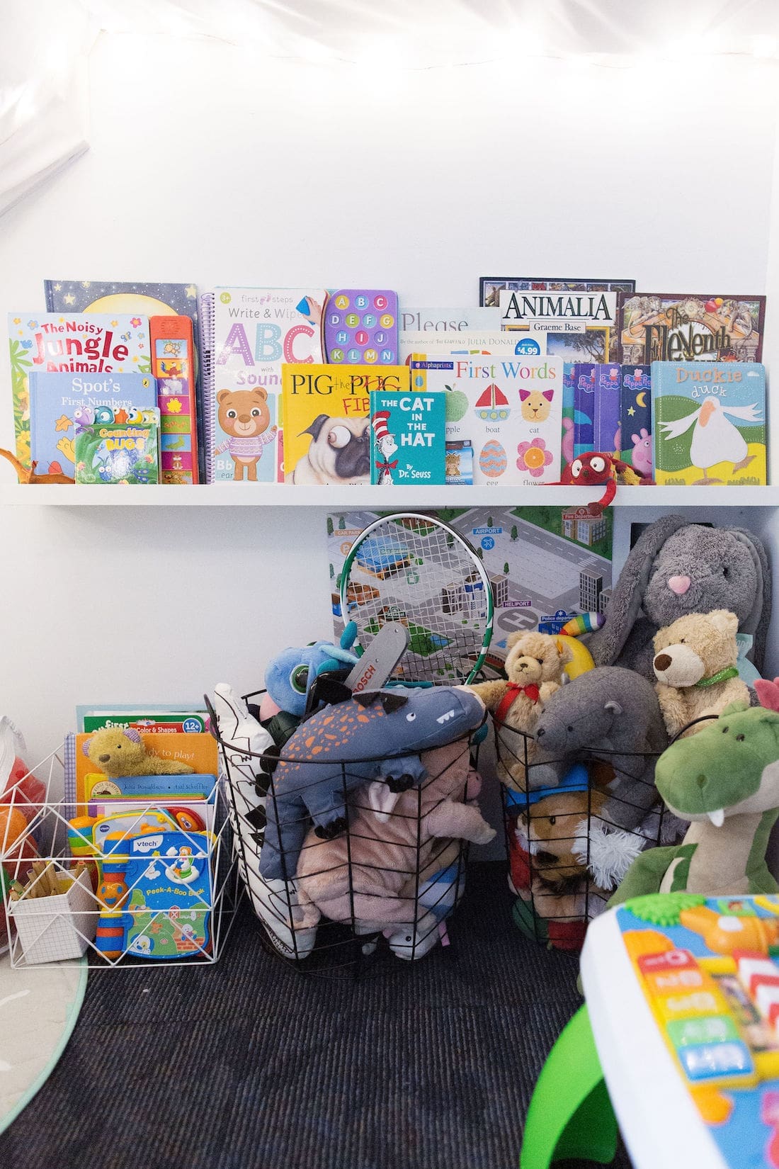 Toy baskets in under stair cubby