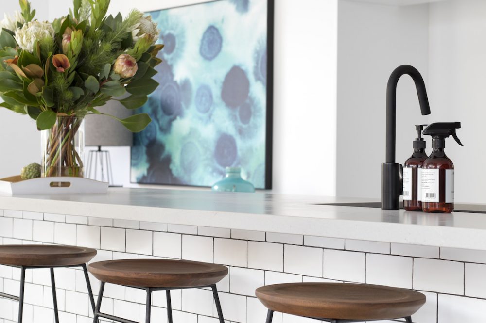 White kitchen with black tapware luxe looks for less
