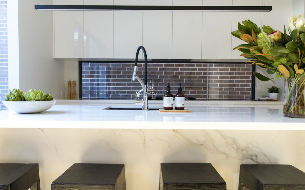 White kitchen with marble island bench luxe looks for less